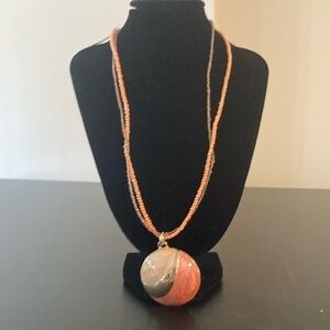 Macy's Orange Beaded Necklace with Swirl Pendant
